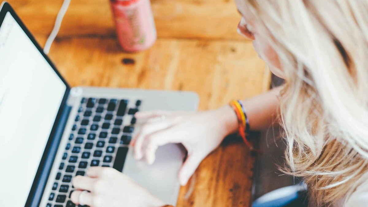 student at home on a computer