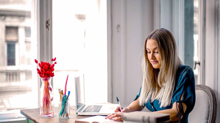 Woman sitting at a desk working