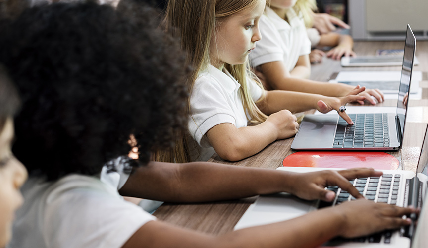 School kids on computer