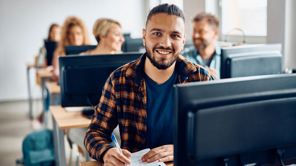 Group of student taking online exam on computer