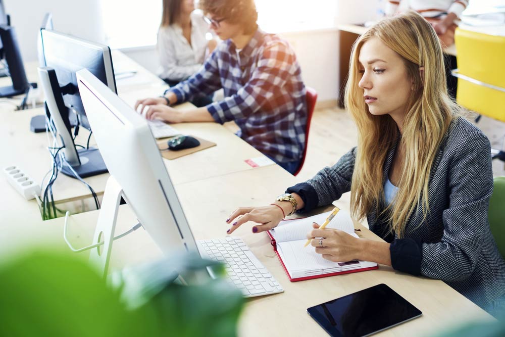 female employee using an online exam system