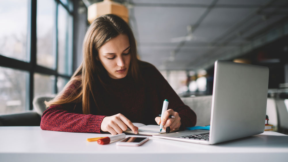 girl completing online assessment